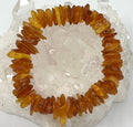 Light-colored Baltic Amber flat nugget bracelet with 12mm-18mm beads, crafted by World Wide Gems Minerals Beads.