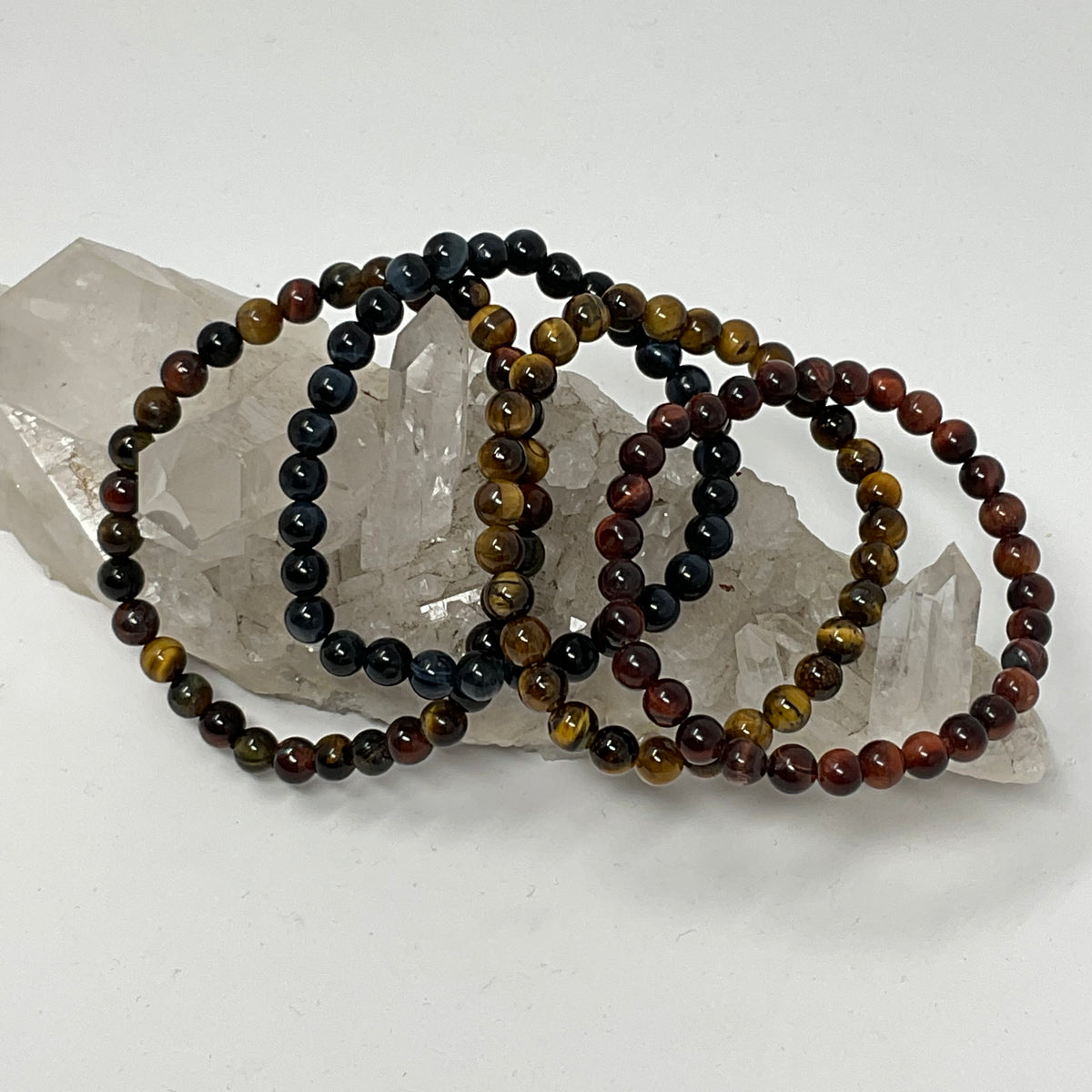 Best Of All Worlds Tiger Eye Set: 6mm Yellow, Red, Blue & Multi-Colored Tiger Eye 4-Piece Round Bracelet Set Set