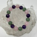 Set of three 12mm round gemstone bracelets featuring Amethyst, Green Aventurine, and Rose Quartz by World Wide Gems Minerals Beads