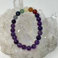 Amethyst with 7-mineral chakra 8mm round gemstone bracelet from World Wide Gems Minerals Beads, featuring colorful mineral beads.