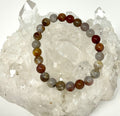 Brazilian Grey Agate 8mm bracelet set with three beaded bracelets by World Wide Gems Minerals Beads, featuring polished grey agate stones.