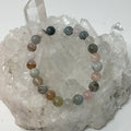 Brazilian multi-color Morganite 8mm round bracelet featuring vibrant, polished beads from World Wide Gems Minerals Beads.
