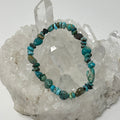Chinese turquoise nugget shape bracelet with 6mm-8mm beads from World Wide Gems Minerals Beads, showcasing vibrant blue stones.
