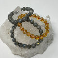 Three 10mm round citrine and labradorite bracelets from World Wide Gems Minerals Beads, featuring vibrant gemstone beads.