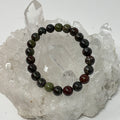 Copper Jasper 8mm round bracelet featuring polished copper jasper beads, crafted by World Wide Gems Minerals Beads.