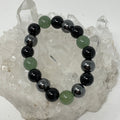 Green Aventurine Triple Protection 12mm round bracelet featuring three mineral beads on a stylish stretch cord.