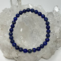 Lapis 6mm round bracelet set with two beaded bracelets from World Wide Gems Minerals Beads displayed on a neutral background.