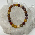 Set of three Mookaite 8mm round gemstone bracelets by World Wide Gems Minerals Beads, showcasing earthy tones and polished round beads.