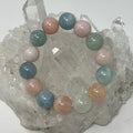 Morganite 14mm round bracelet featuring pink gemstones from World Wide Gems Minerals Beads, showcasing elegant, polished bead design.