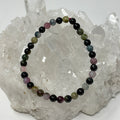 Multi-color tourmaline 6mm round bracelet set by World Wide Gems, two-piece jewelry with vibrant gemstone beads.