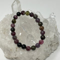 Two multi-color tourmaline 8mm round gemstone bracelets from World Wide Gems Minerals Beads, showcasing vibrant, polished stones.