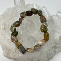 Rhyolite 8mm-12mm nugget shape bracelet by World Wide Gems Minerals Beads, featuring natural stone beads in a stylish jewelry design.