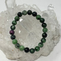 Ruby and zoisite 8mm round gemstone bracelet by World Wide Gems Minerals Beads, featuring vibrant red and green stones.