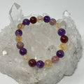 All-Star Quartz bracelet featuring Strawberry Quartz, Citrine, and Amethyst 10mm round beads from World Wide Gems Minerals Beads.