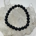 Black Tourmaline matte finish 8mm round bracelet set with three beaded bracelets from World Wide Gems Minerals Beads.