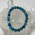 Blue Apatite 8mm round gemstone bracelet set by World Wide Gems Minerals Beads, featuring two stylish matching bracelets.