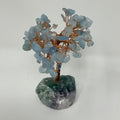 Blue aquamarine mineral tree sculpture with detailed branches and base, crafted by World Wide Gems Minerals Beads.