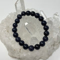 Blue Goldstone 10mm round bracelet set with three beaded bracelets by World Wide Gems Minerals Beads, showcasing sparkling blue and gold accents.