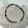 Botswana Agate 6mm round gemstone bracelet by World Wide Gems Minerals Beads, showcasing polished natural stone beads.