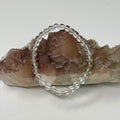 Set of three Crystal Quartz 6mm round bracelets from World Wide Gems Minerals Beads, showcasing clear, polished gemstone beads.