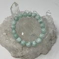 Green Angelite 10mm round bracelet by World Wide Gems Minerals Beads featuring polished green angelite gemstone beads.