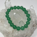 Three green aventurine round bead bracelets, 10mm size, from World Wide Gems Minerals Beads, displayed together in a set.