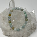 Green Burma Jade 8mm round bracelet set from World Wide Gems Minerals Beads, featuring two elegant jade bracelets.