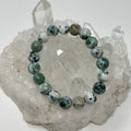 Green Tree Agate 10mm round bracelet from World Wide Gems Minerals Beads featuring polished green agate beads arranged in a circular jewelry design.
