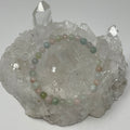Multi-color 6mm aquamarine round bracelet set from World Wide Gems Minerals Beads, featuring two colorful gemstone bracelets.