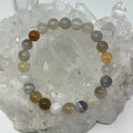 Multi-color Botswana Agate 8mm round bracelet set by World Wide Gems Minerals Beads, featuring three vibrant gemstone bracelets.