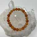 Red aventurine 8mm round bracelet set with three stretch bracelets from World Wide Gems Minerals Beads.