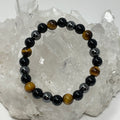 Yellow Tiger Eye triple protection 8mm round bracelet set with three mineral stones, crafted by World Wide Gems Minerals Beads.
