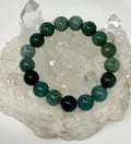 Moss Agate 12mm round bracelet with polished beads, featuring natural green and brown moss patterns from WorldWideMinerals-beads.