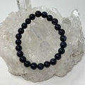 8mm blue goldstone round bracelet from WorldWideMinerals-beads featuring sparkling blue and gold stone beads.
